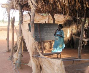 A makeshift, open-air classroom in Nimporodioula where children took classes before the new school was built